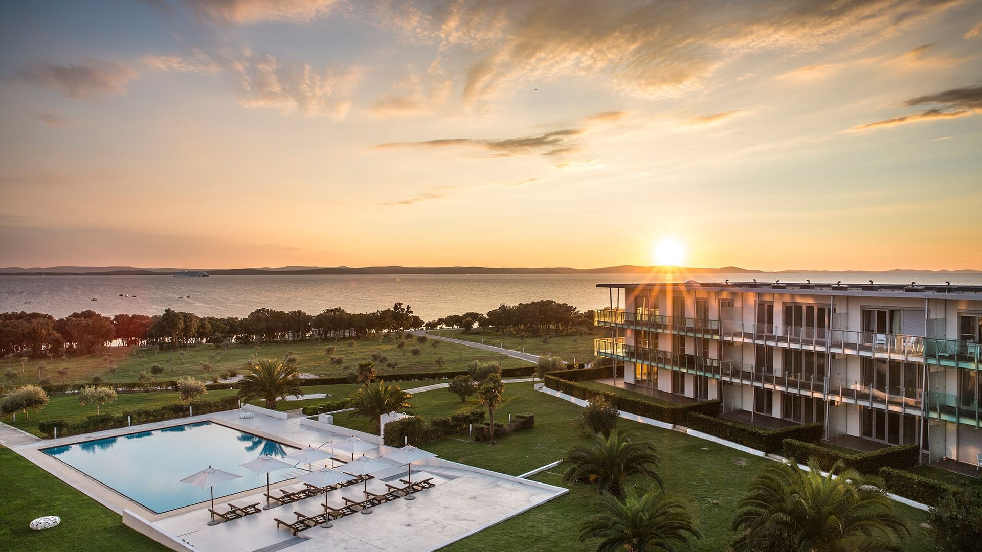 Pool, hotel & ocean view at Falkensteiner Premium Apartments