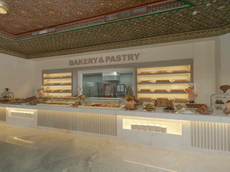 Bakery Station displaying an array of fresh pastries and baked goods at Pickalbatros Palace Resort - Hurghada.