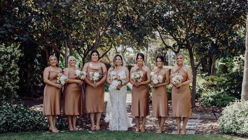 Beautiful bridal party in tropical gardens for central coast wedding