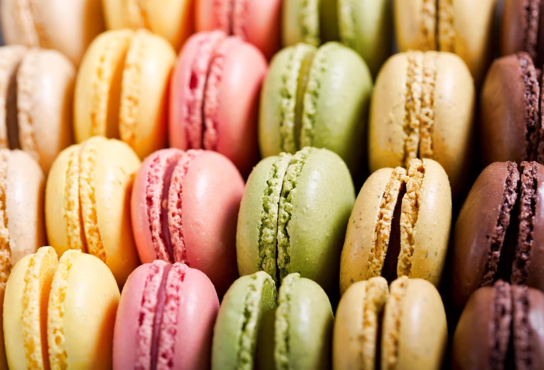 Colorful and delicious macarons arrange at Oceania Hotels