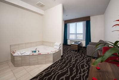 Jetted Spa Tub with amenities in the Spa Suite at Encore Suites Grande Prairie