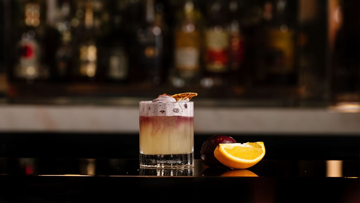 Drink served with orange at TWR at Crown Towers Sydney