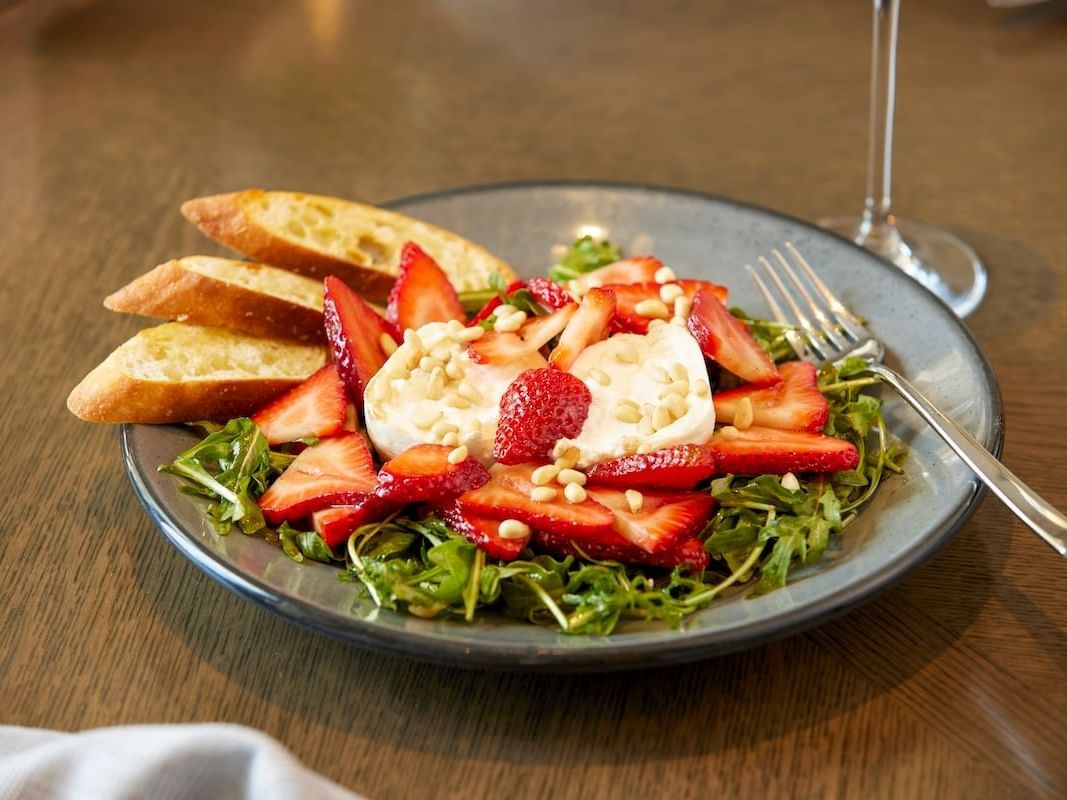 Strawberry Burrata Salad served in The 7880 Club restaurant at Stein Eriksen Residences