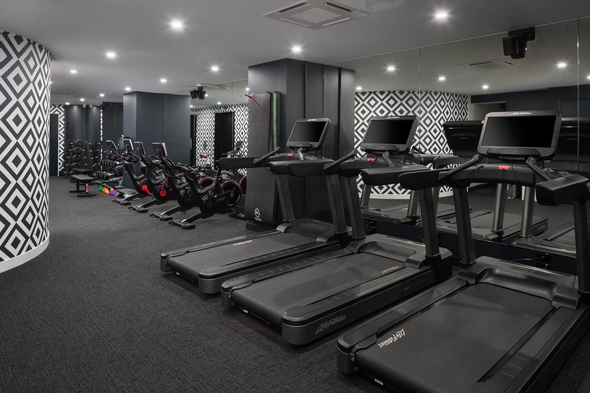 Exercise machines in a Gym at Pullman Melbourne City Centre