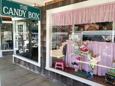 Storefront of The Candy Box with various decorations near Breezeway Boutique Hotel