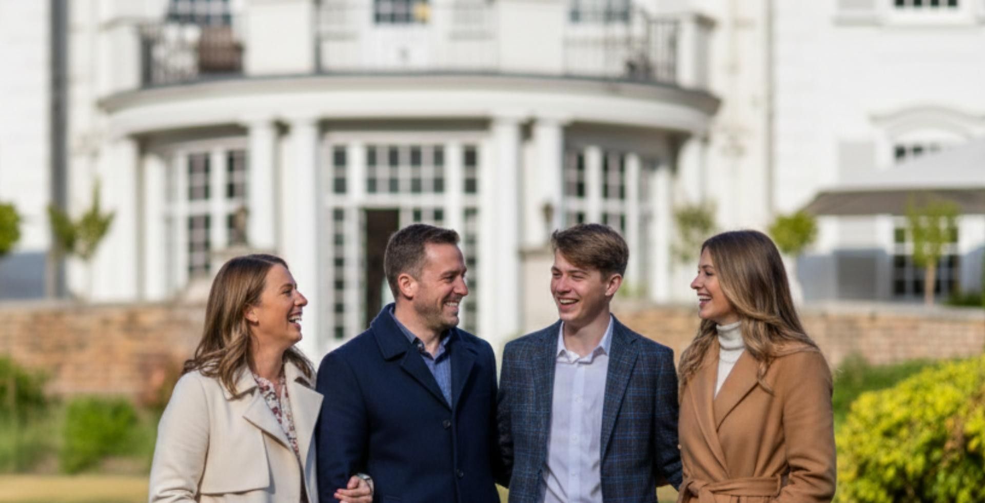 Whole family together outside of Mansion at Gorse Hill providing the best mothers day lunch in Surrey