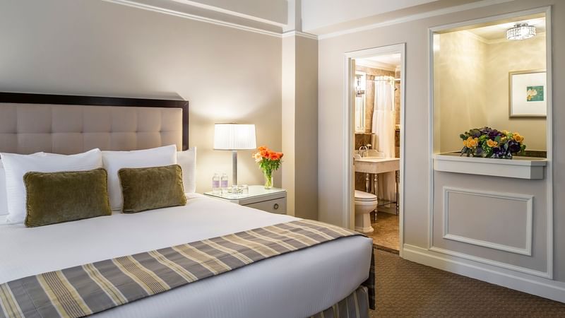 Cozy bed and bathroom in Premier City View at Warwick New York