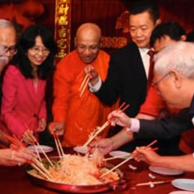 Federal Guests play a game with sticks at Kuala Lumpur Hotels