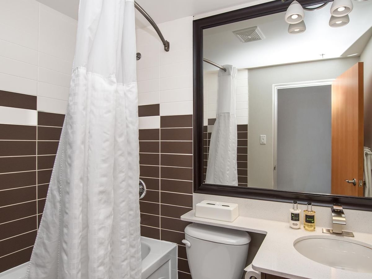Bathroom with sink and toilet.