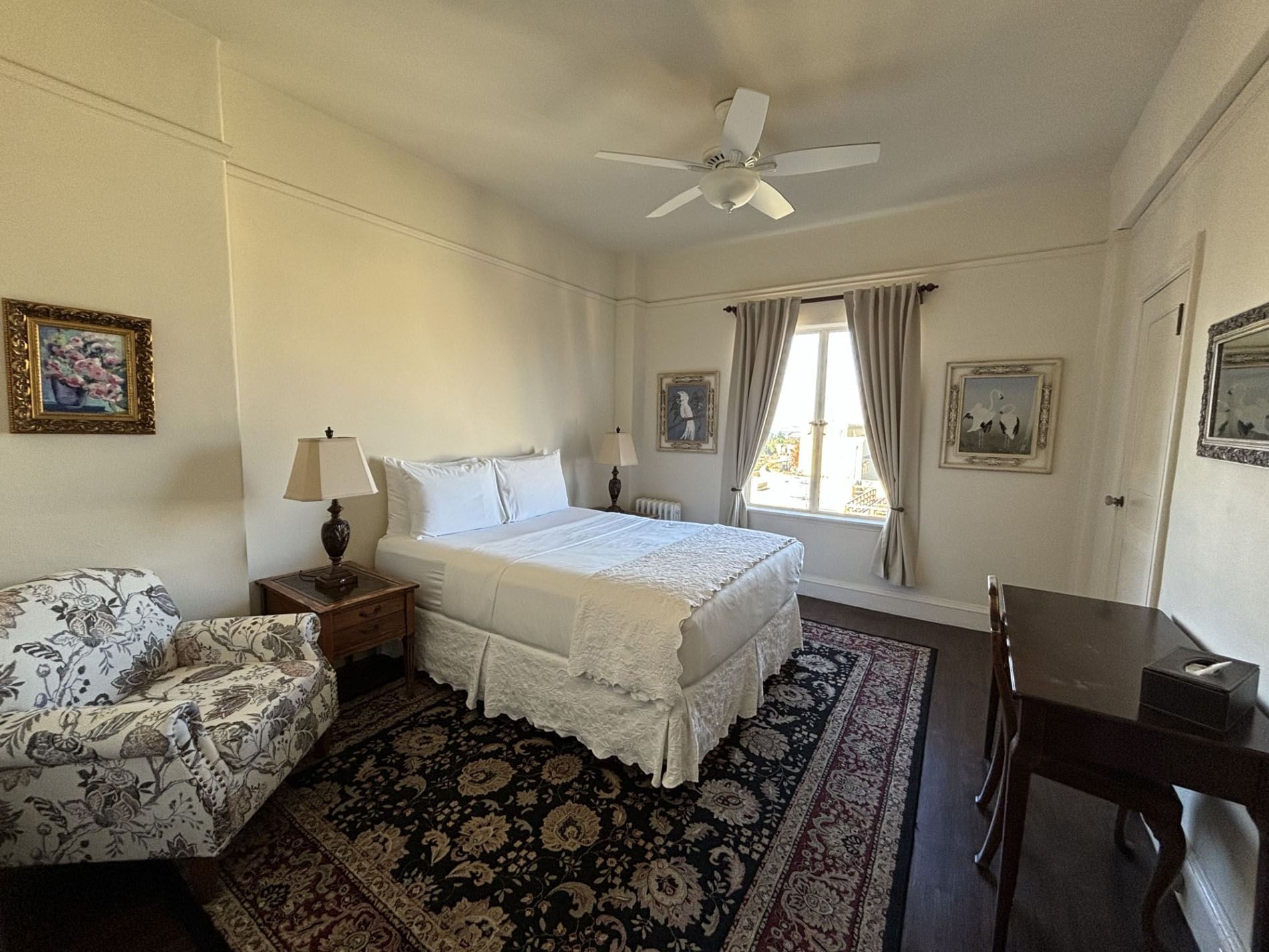 Interior of Standard Queen Room with classic furniture at Berkeley City Club