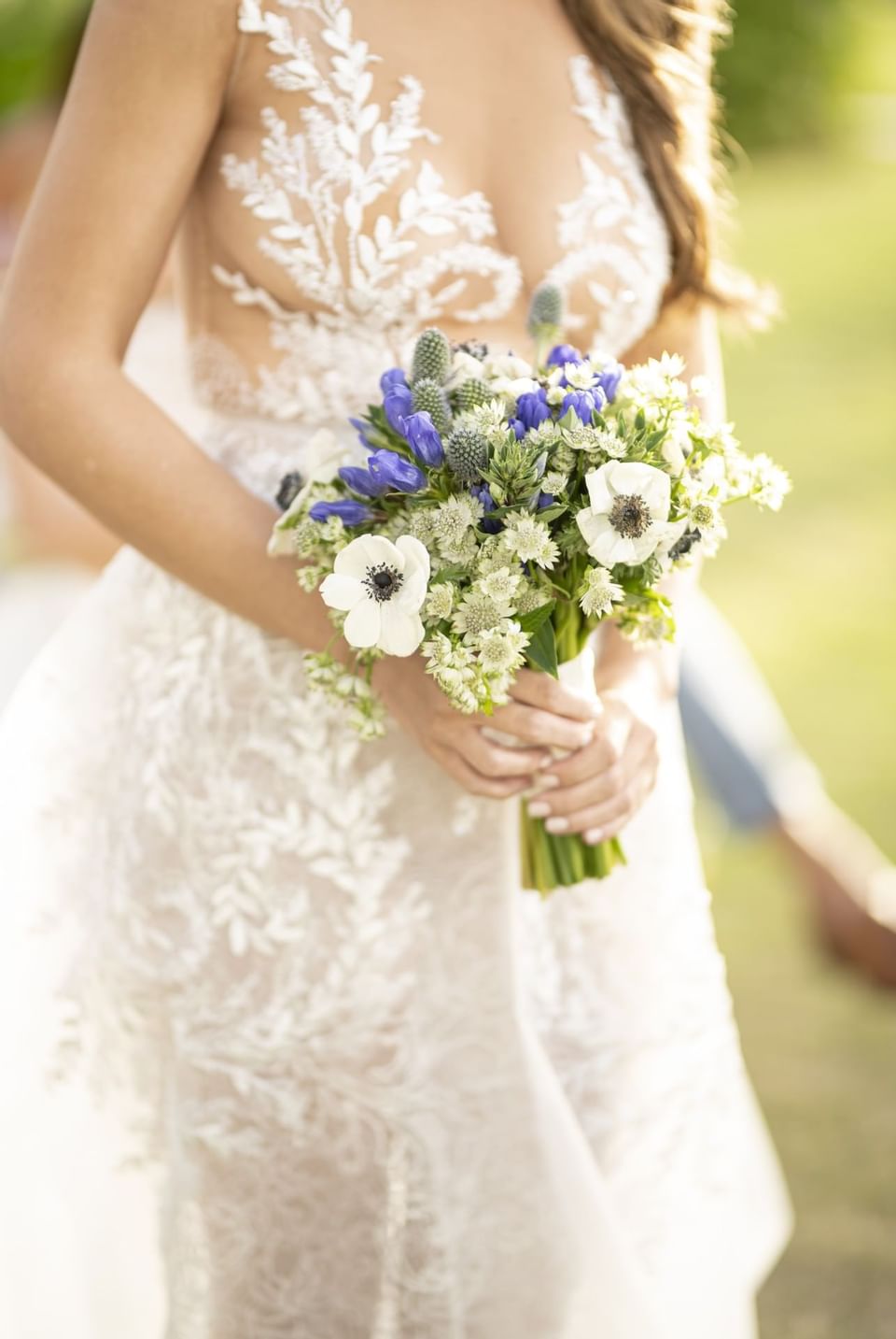 Closeup of a Bride holding a bouquet at Isla Verde Weddings