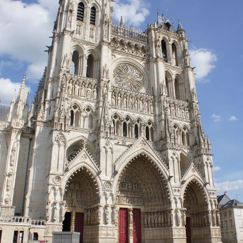 Low angle exterior view of Amiens Cathedral, Originals Hotels