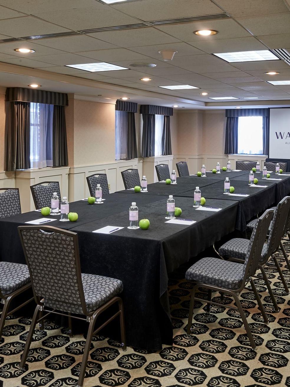 Arranged table and chairs in the Olmsted Room at Warwick Allerton - Chicago.