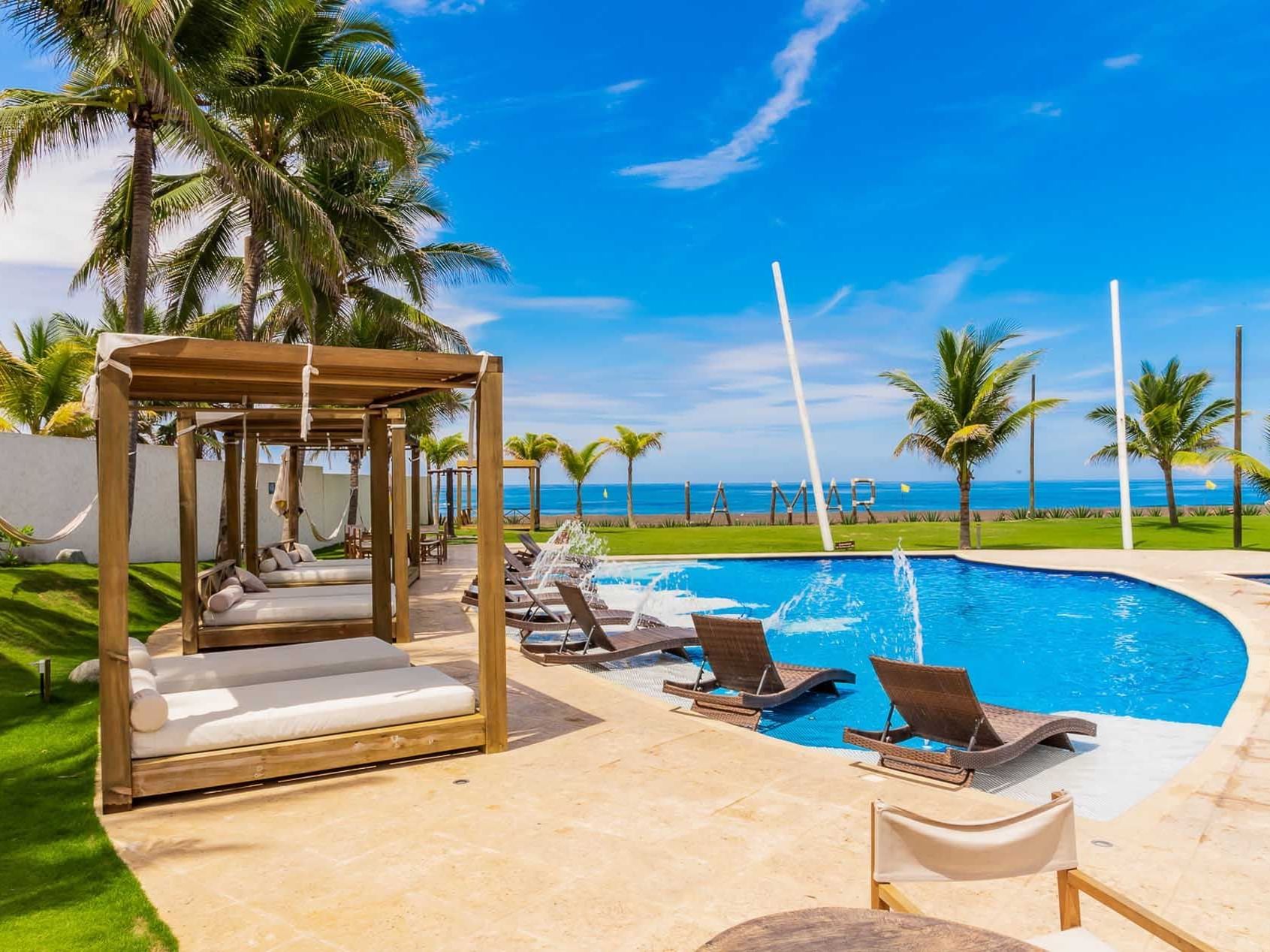 Sunbeds in the pearl beach club at La Mar Monterrico