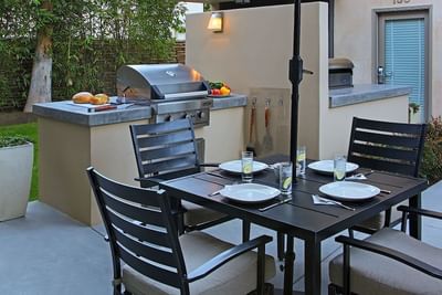 Close up of an outdoor dining setup at 7 Springs Inn & Suites