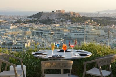 Dining table setup with view in Vertigo at St George Lycabettus