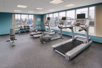 fitness center with cardio equipment