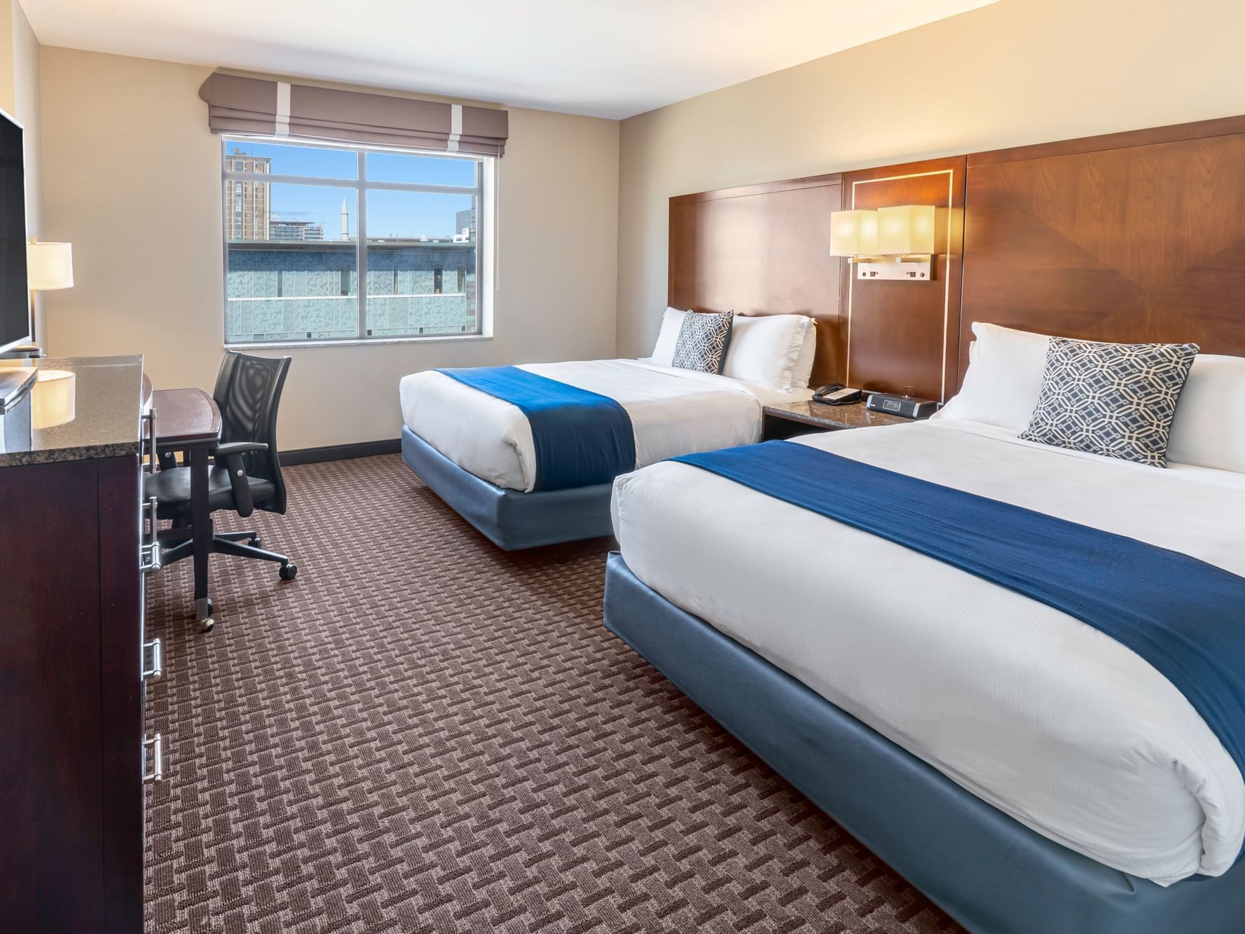 Two Queen Guestroom with two beds at New Haven Hotel