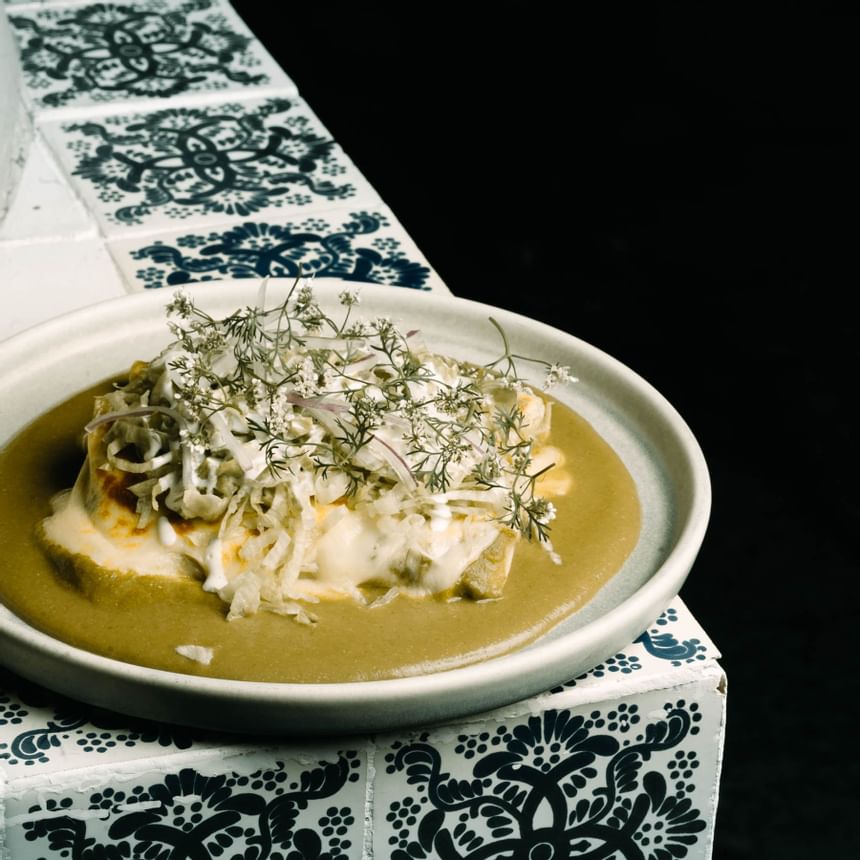 Closeup of a dish served at Casa Azulejos Puebla Hotel