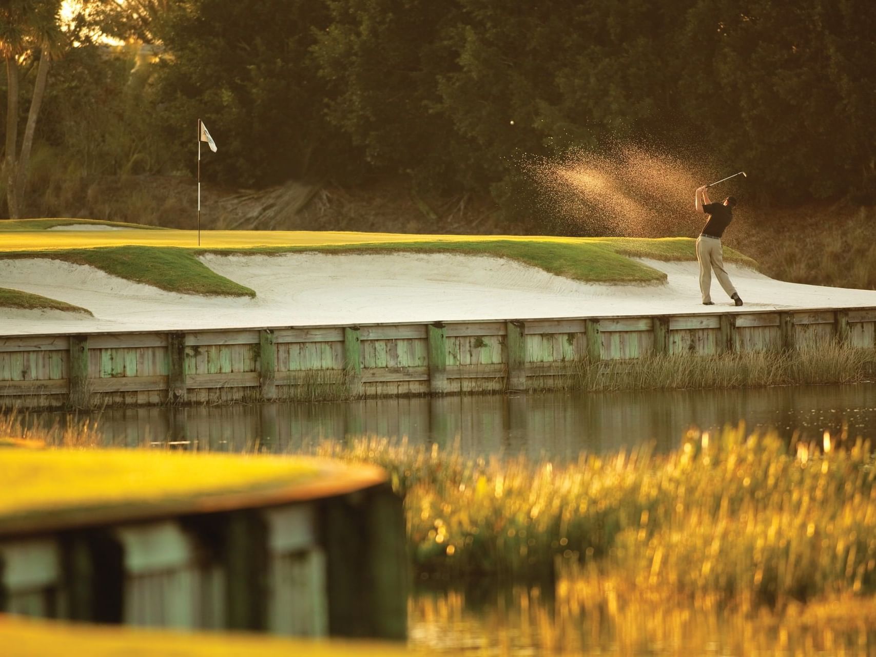 Man on a golf course in the Naples area near Innovations Hotel