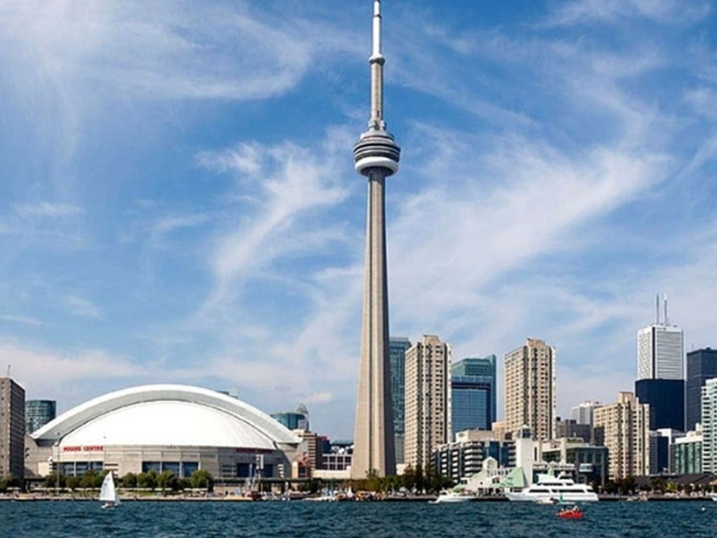 Toronto skyline with CN Tower and Rogers Centre near Hotel X, a hotel in Toronto