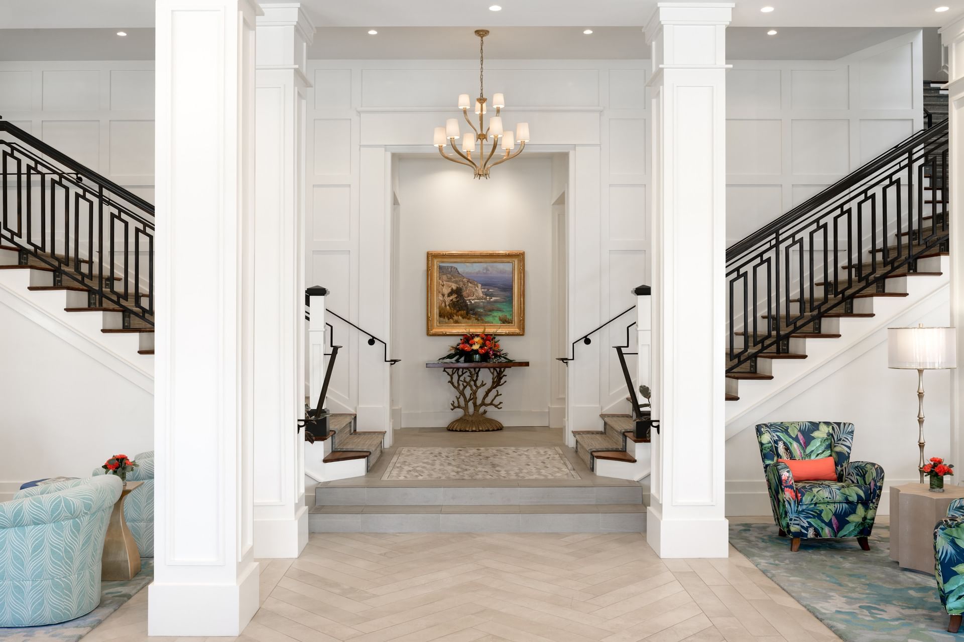 Interior of the lobby lounge area with the stair cases to the balcony at Hotel Atwater