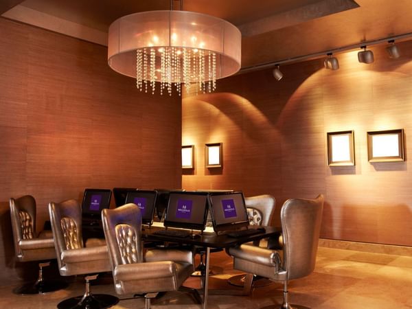 Elegant Business center with chandelier at Megapolis Hotel Panama