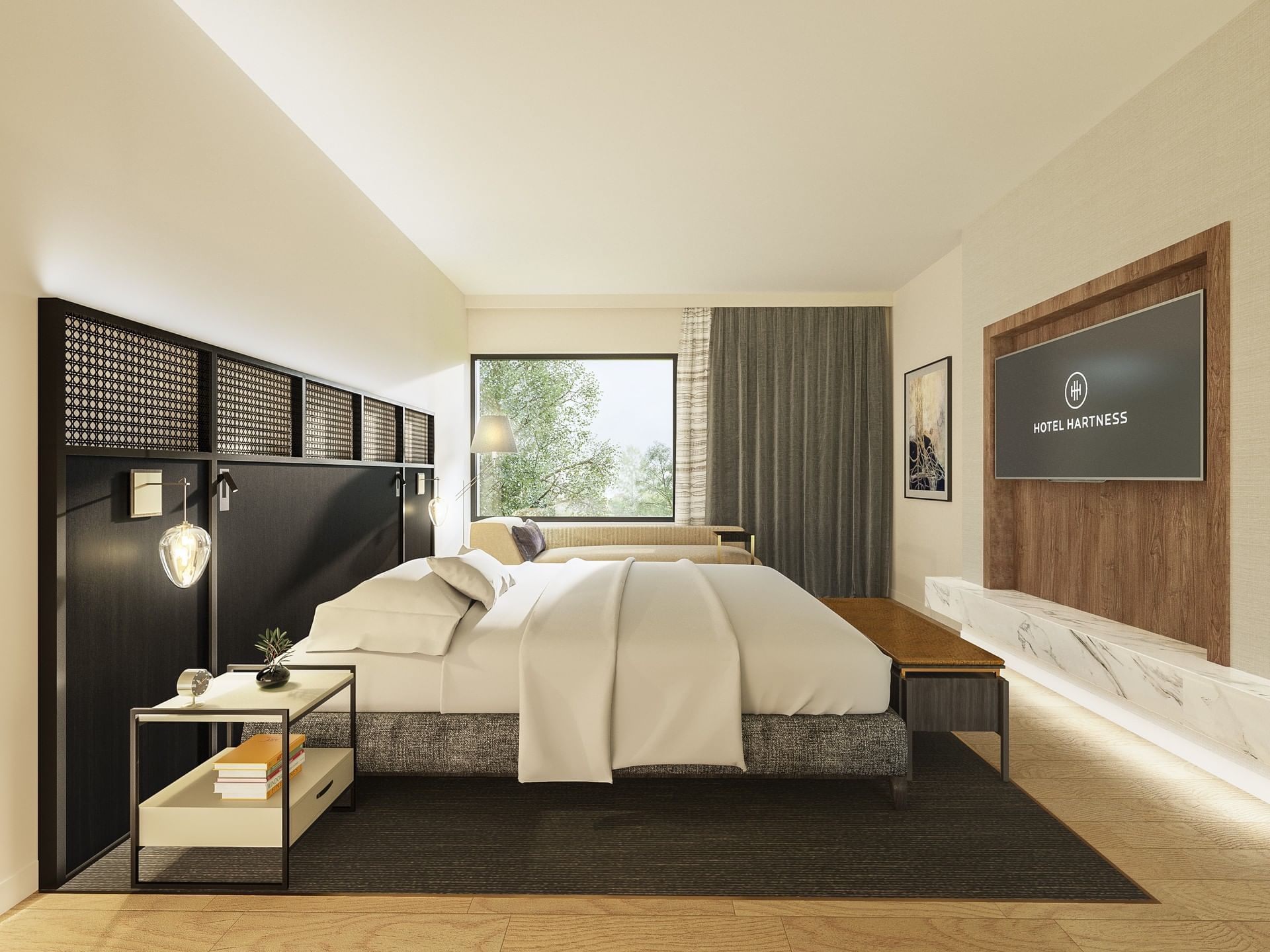Twin beds in Deluxe Queen Room at Hotel Hartness