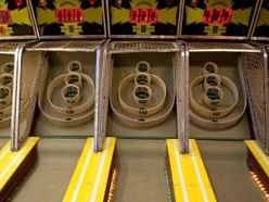 Three skee ball ramps with scoring holes in Fun-O-Rama near Union Bluff Hotel