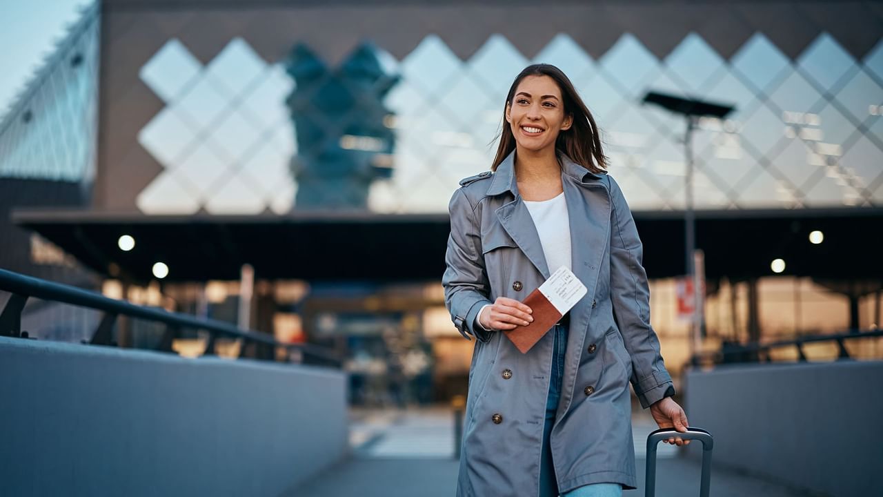 Woman walking out of an airport