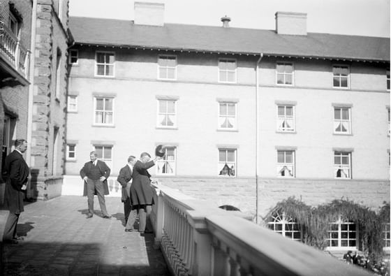 Teddy Roosevelt waving from balcony at Hotel Colorado