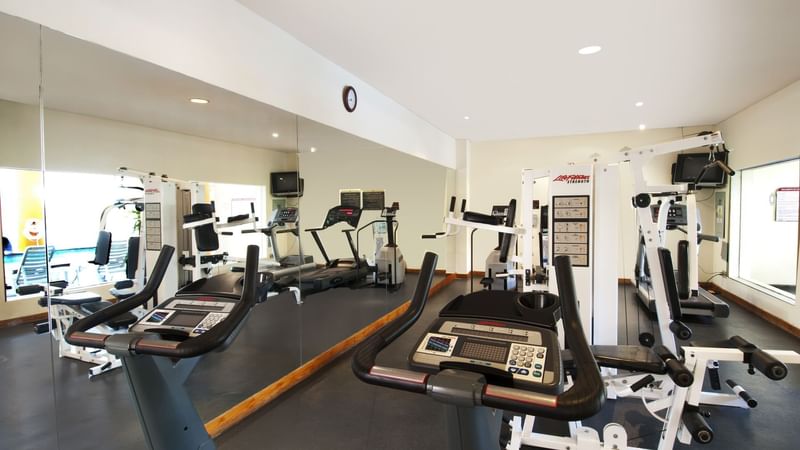 Exercise machines in the gym at Fiesta Inn Hermosillo