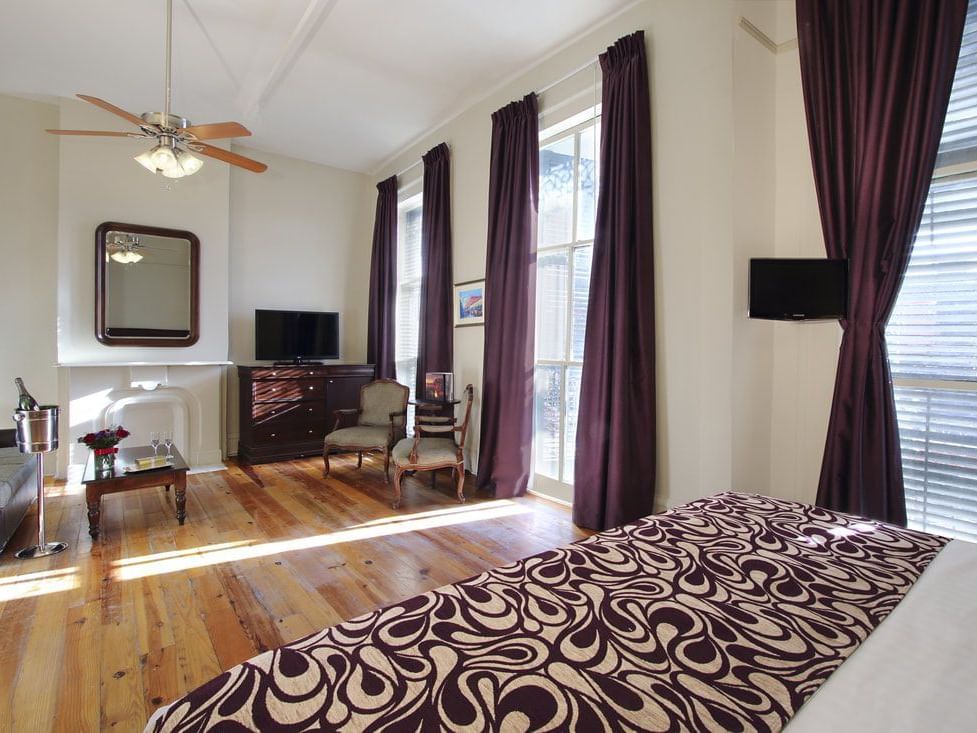 Bed & lounge, Armstrong suite at French Quarter Guesthouses