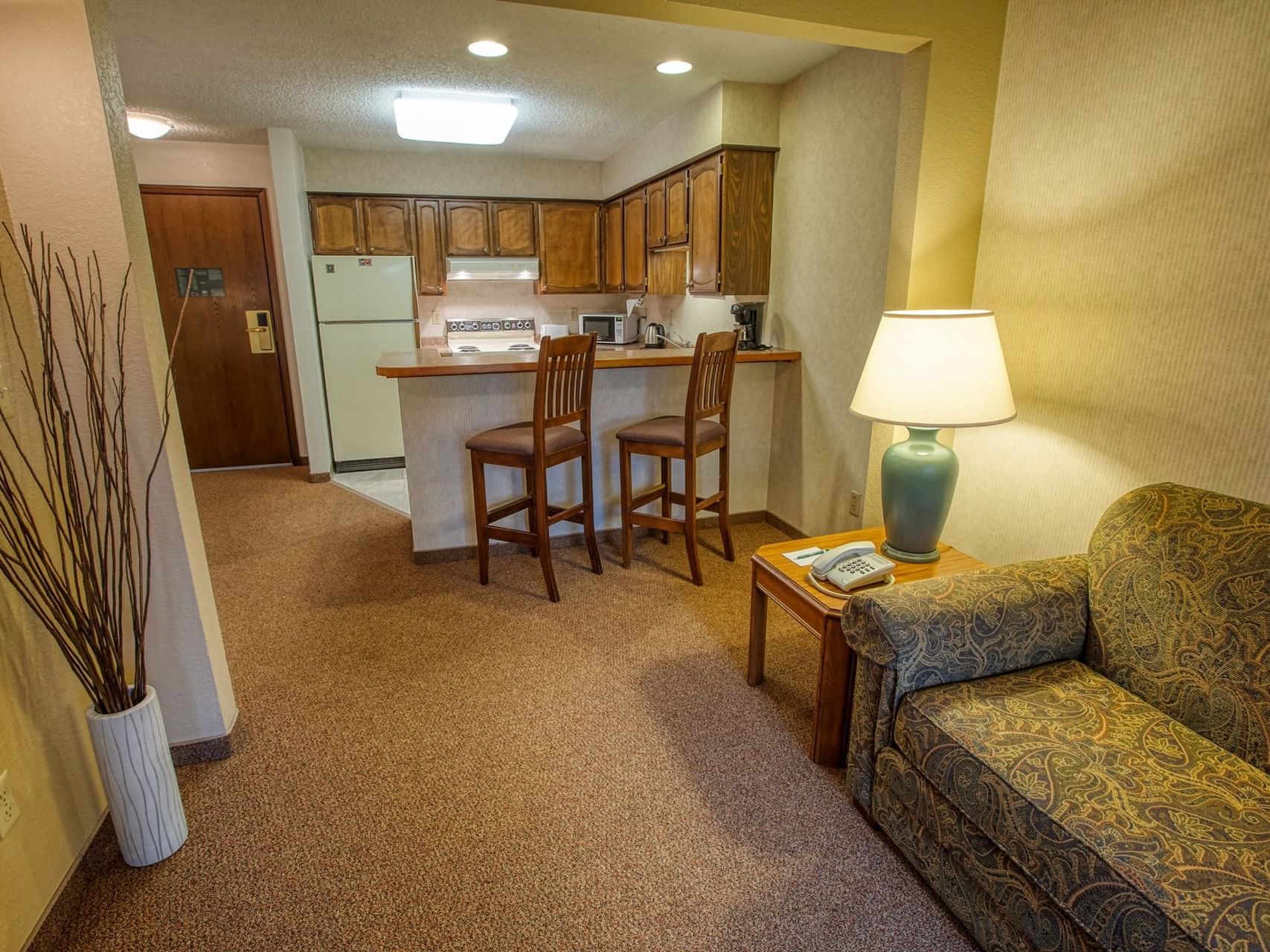 Living room view of Jacuzzi Suite at Sophie Station Suites