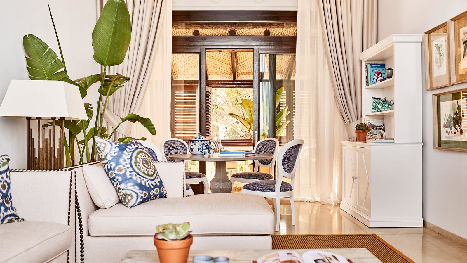 Imperial Beach Suite sitting area with chaise lounge, dining set, and terrace view at Marbella Club