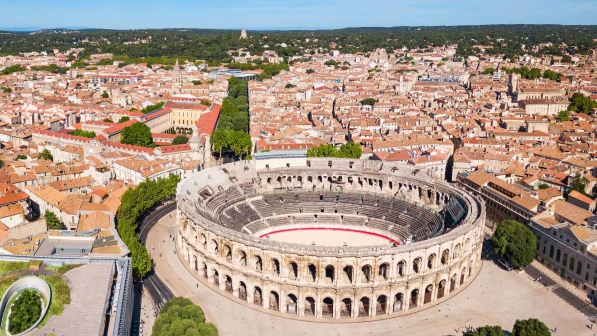 Aerial view of the Amphitheatre at Nimes near Originals Hotels
