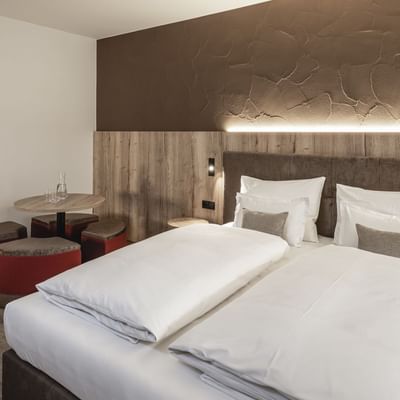 Large bed in Deluxe Family Suite Lido, Falkensteiner Hotels