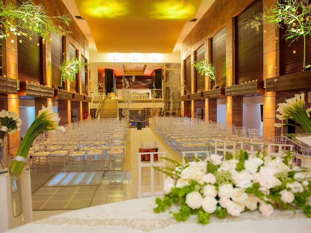 The event hall arranged for a wedding ceremony at FA Hotels