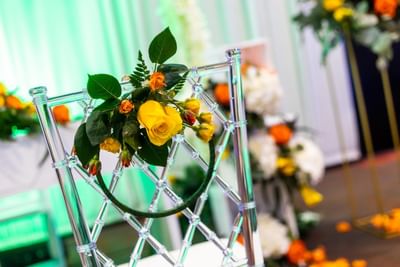 Floral décor on an chair arranged for an Event at Playa Blanca Beach Resort