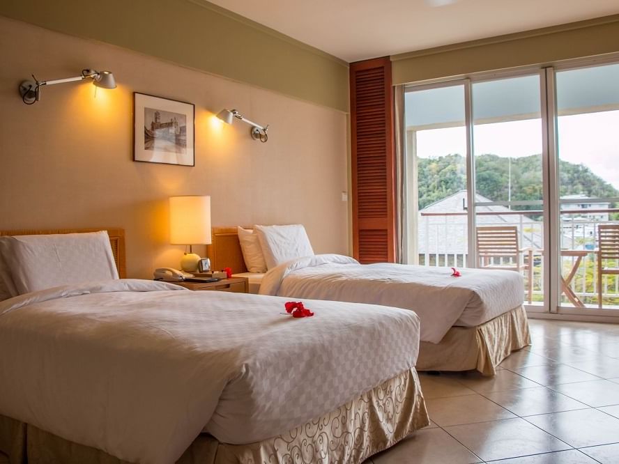 Twin beds in a Superior Garden View Room at Palau Royal Resort