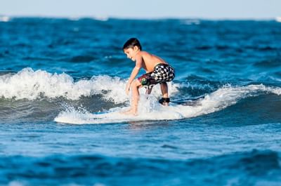 Kid Surfing at Goodwinds Water Sports