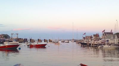 Ferries parked by the dock in the evening near Falmouth Tides
