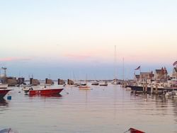 Ferries parked by the dock in twilight near Falmouth Tides