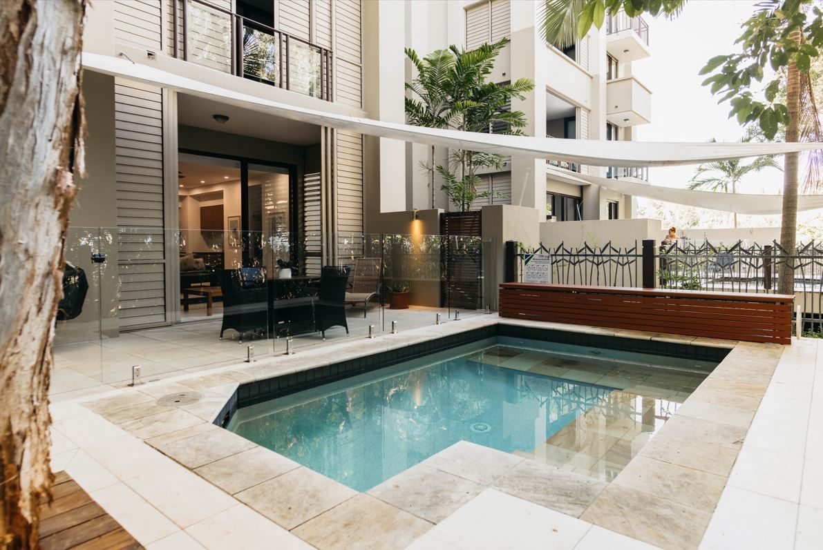 Pool with dining table, Pullman Palm Cove Sea Temple Resort