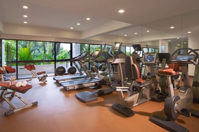 Exercise equipment in a fitness center at Goodwood Park Hotel