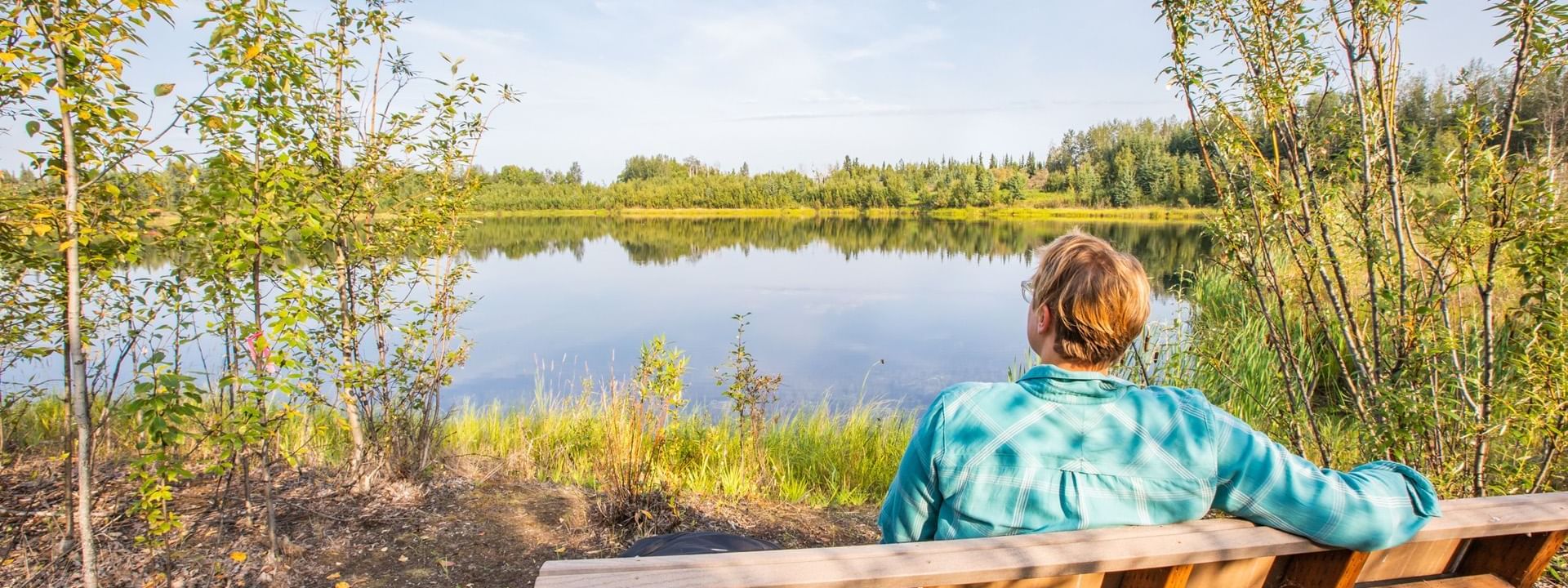view of a lake and woman at Wedgewood Resort