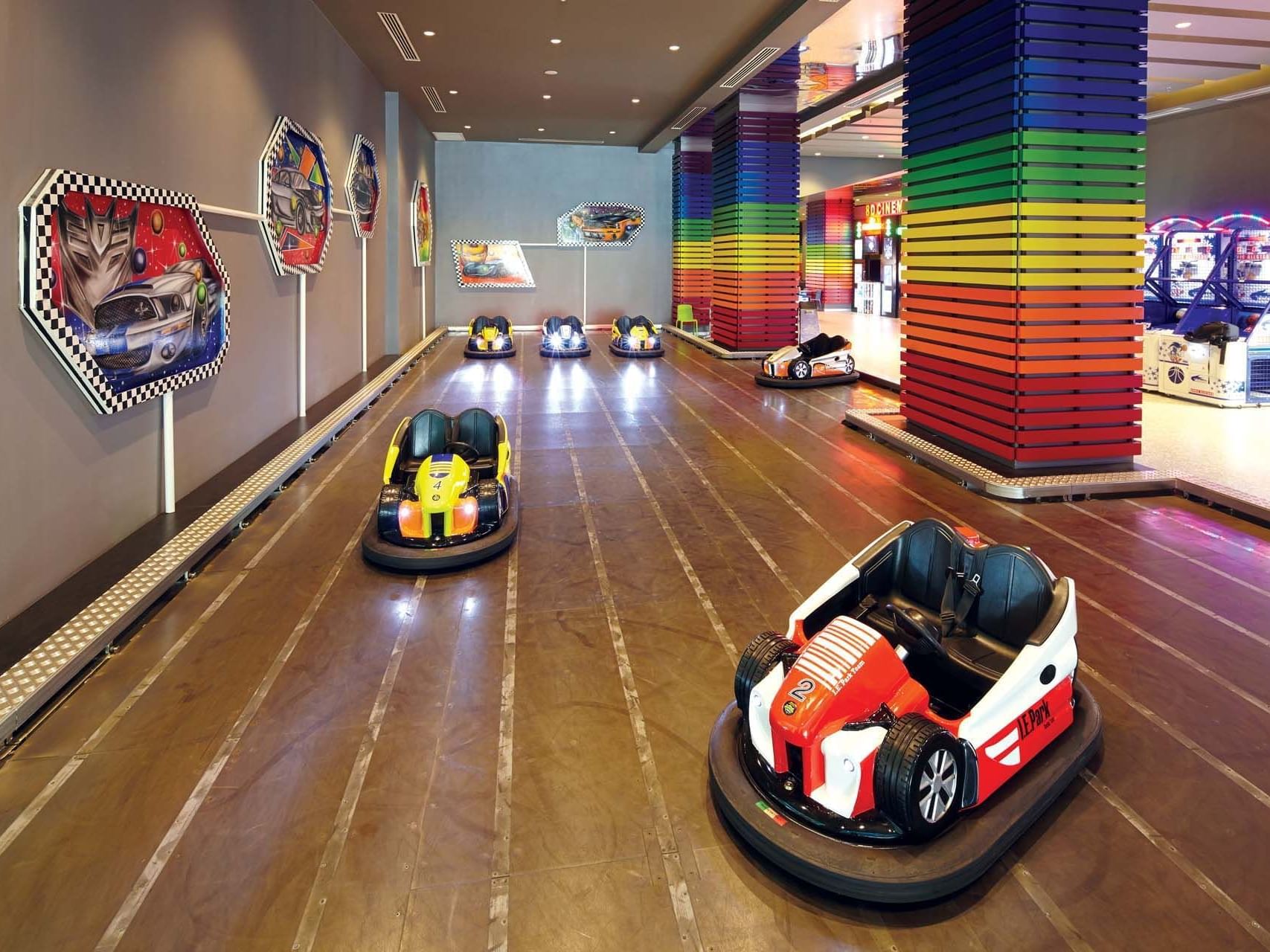 An indoor bumper car play area in Game Center near Titanic Deluxe Golf Belek