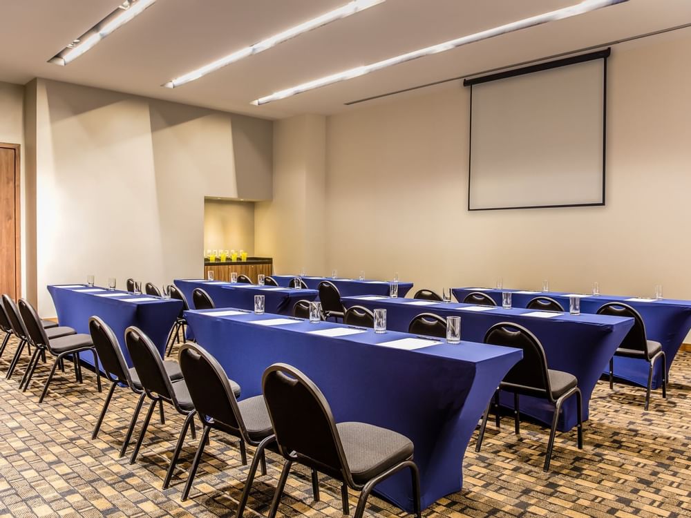 Meeting room table setup in Salon A at Fiesta Inn Hotels