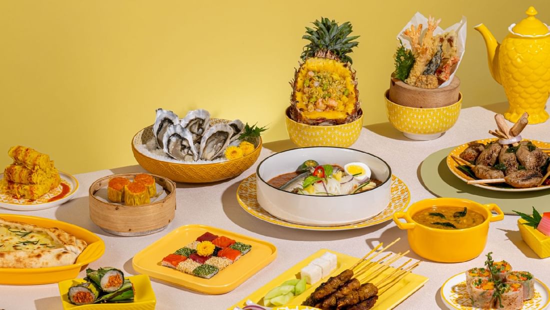 A bountiful Pan-Asian buffet spread with oysters, satay, and sushi, served at Sunway Hotel Pyramid