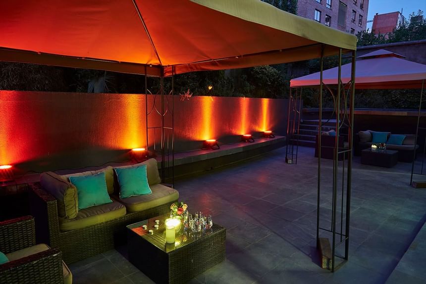An outdoor lounge area at Hotel Torremayor Lyon